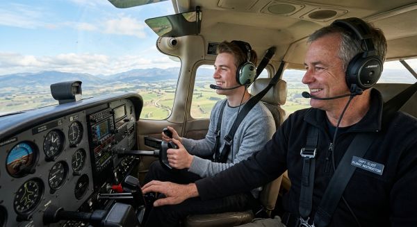 Taking control during a flying lesson